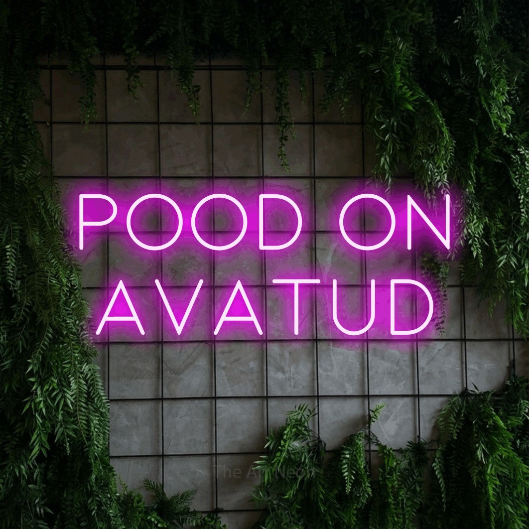 LED neon sign reading “pood on avatud”, arranged in two lines.