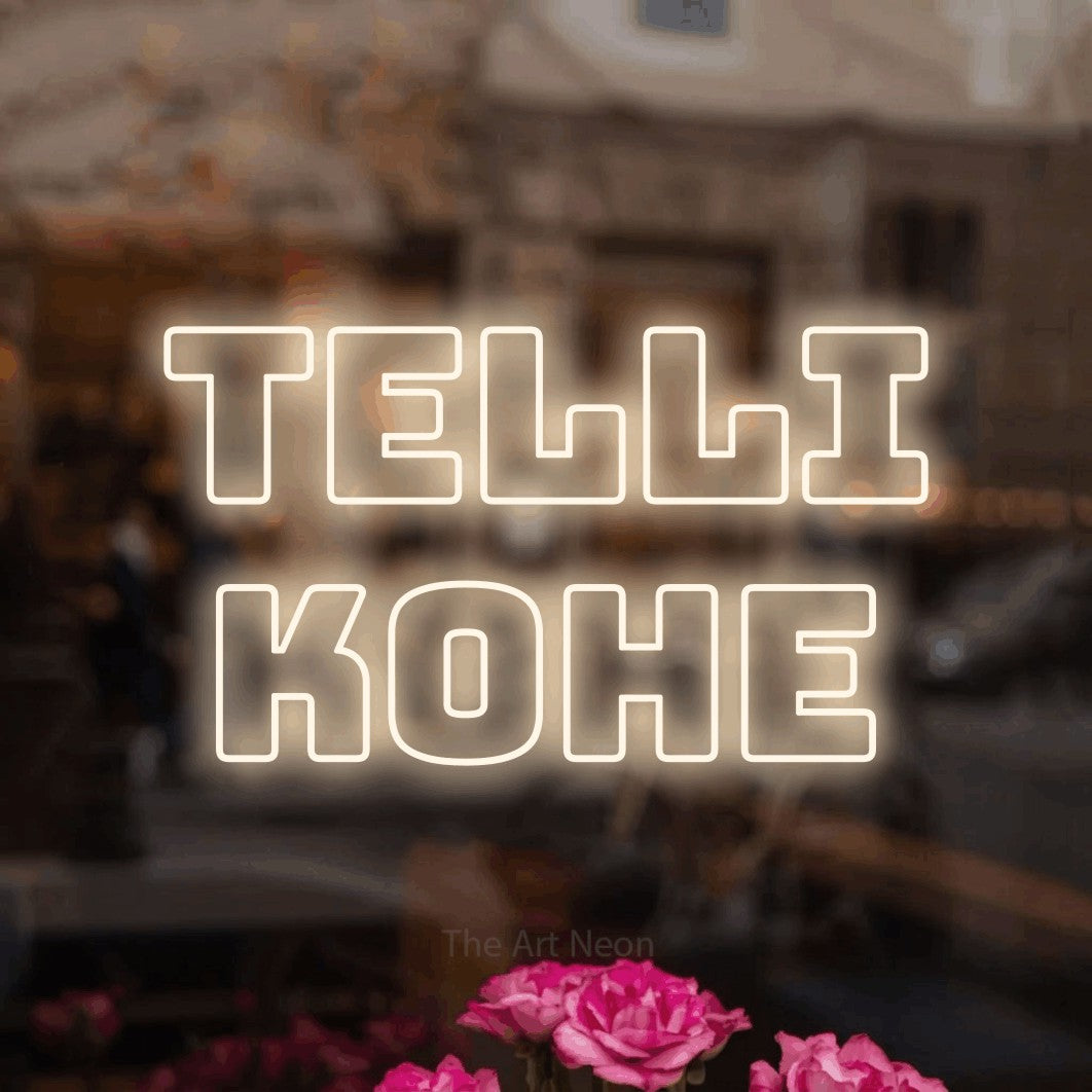 LED neon sign reading “Telli Kohe”, arranged in two lines.