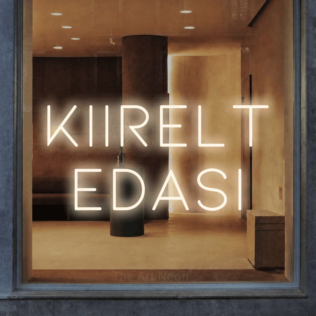LED neon sign reading “KIIRELT EDASI”, arranged in two lines.
