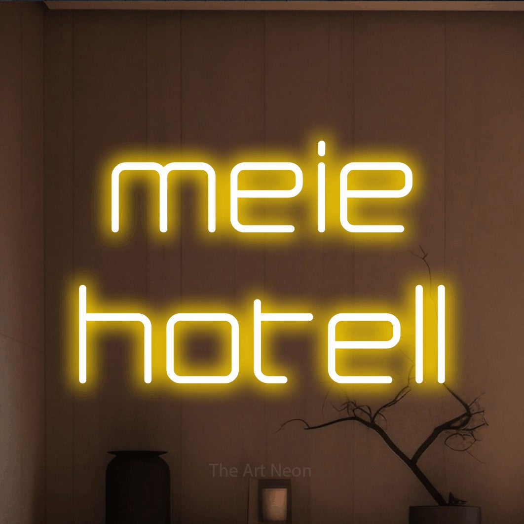 LED neon sign reading “meie hotell”, arranged in two lines.