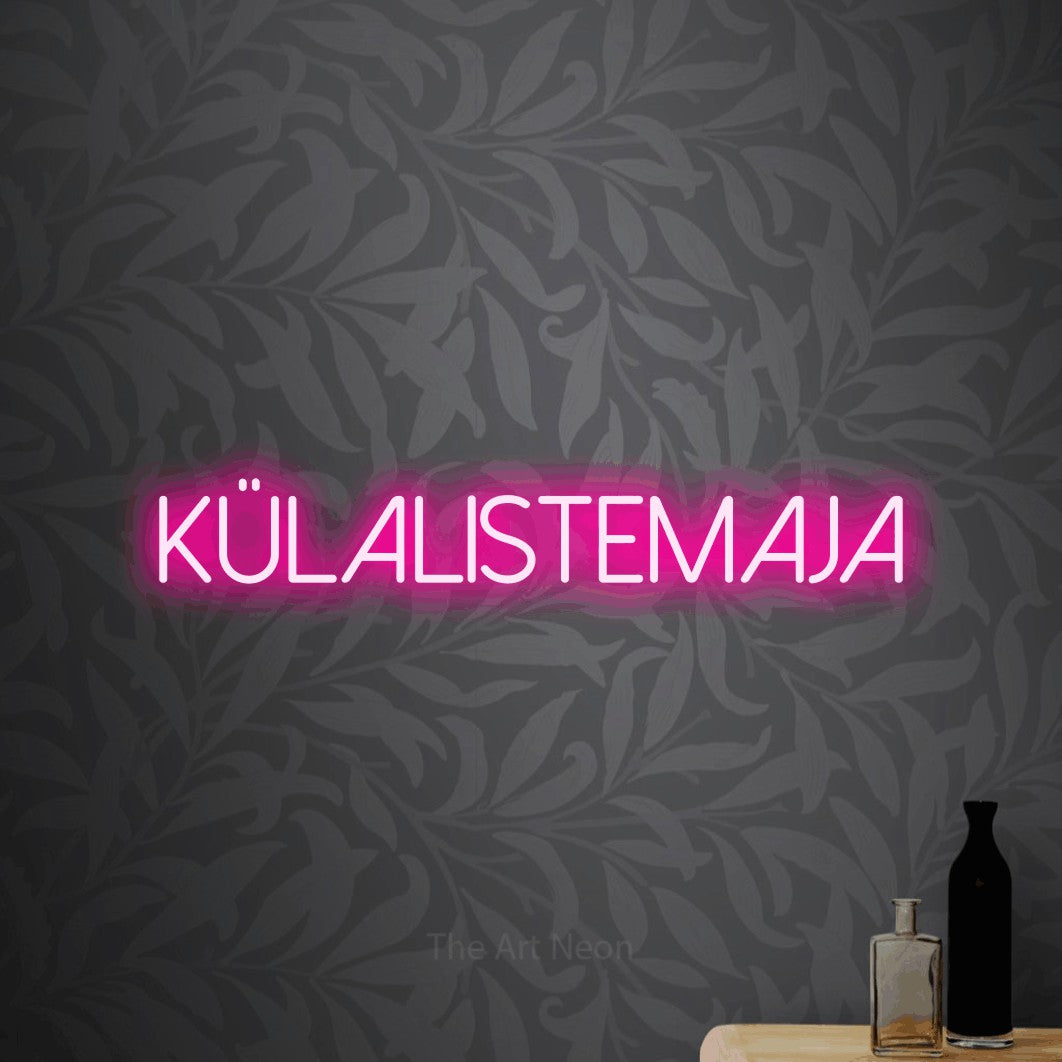 LED neon sign reading “KÜLALISTEMAJA”, arranged in a single line.