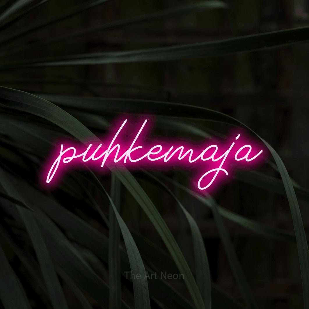 LED neon sign reading “puhkemaja”, arranged in a single line.