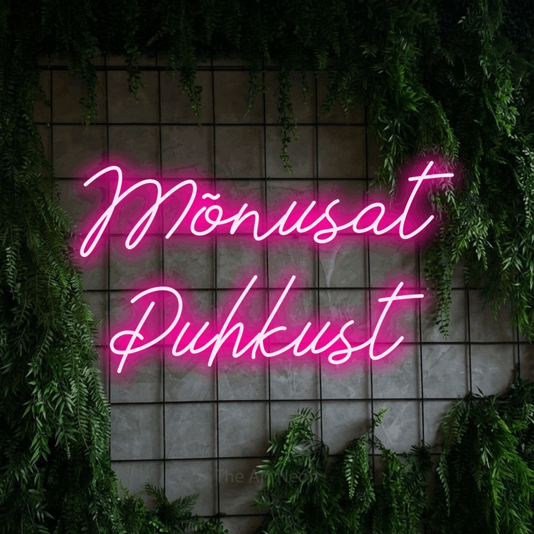 LED neon sign reading “Mõnusat Puhkust”, arranged in two lines.