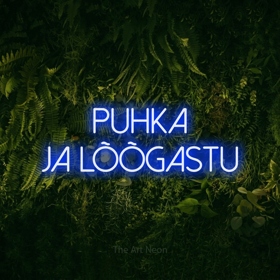 LED neon sign reading “puhka ja lõõgastu”, arranged in two lines.
