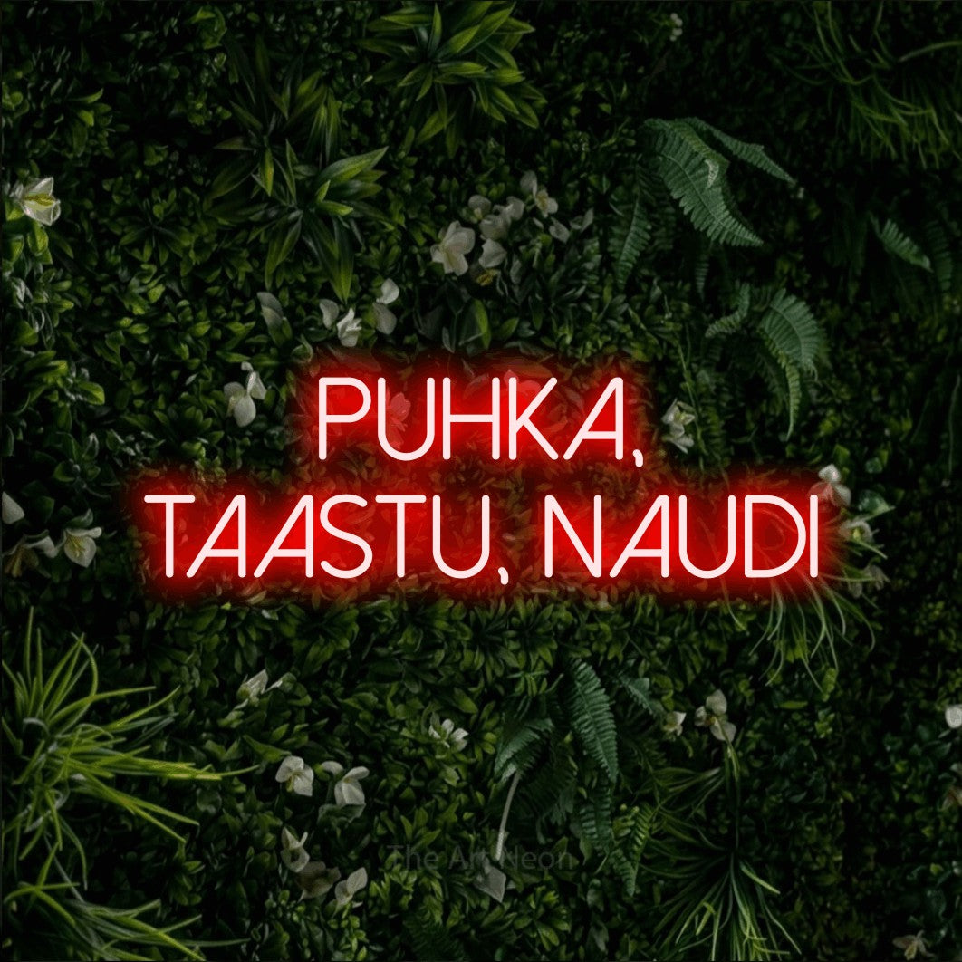 LED neon sign reading “Puhka, Taastu, Naudi”, arranged in two lines.