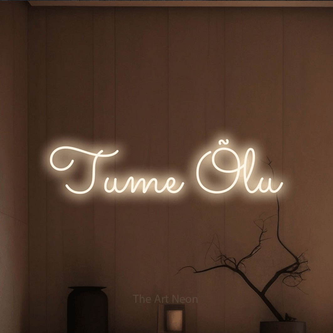 LED neon sign reading “Tume Õlu”, arranged in a single line.