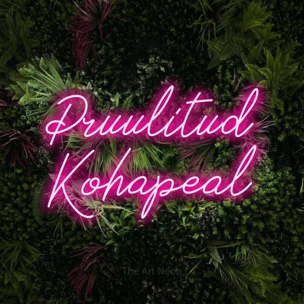 LED neon sign reading “Pruulitud Kohapeal”, arranged in two lines.