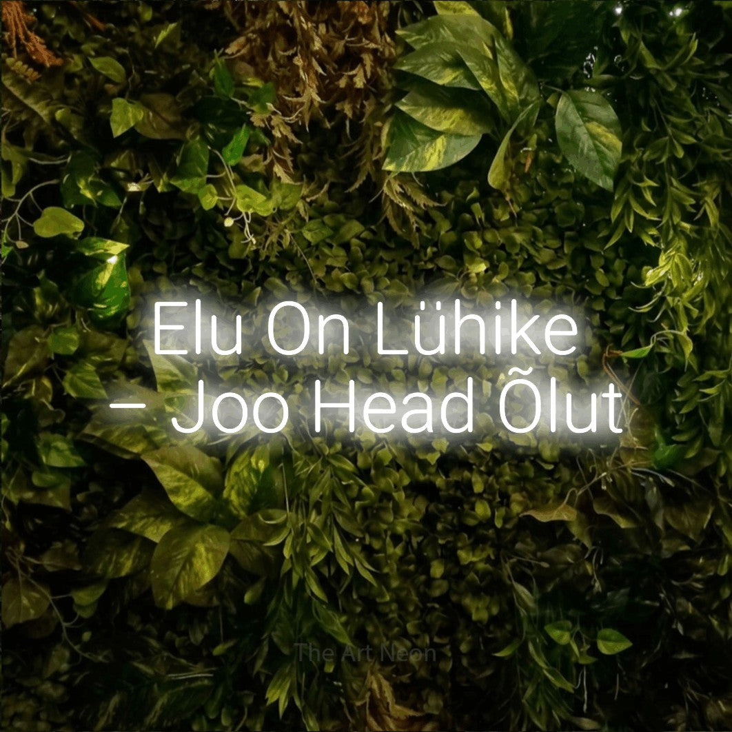 LED neon sign reading “Elu On Lühike – Joo Head Õlut”, arranged in two lines.