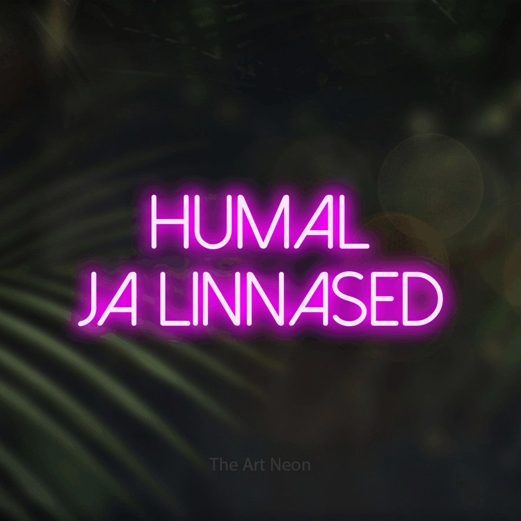 LED neon sign reading “HUMAL Ja LINNASED”, arranged in two lines.