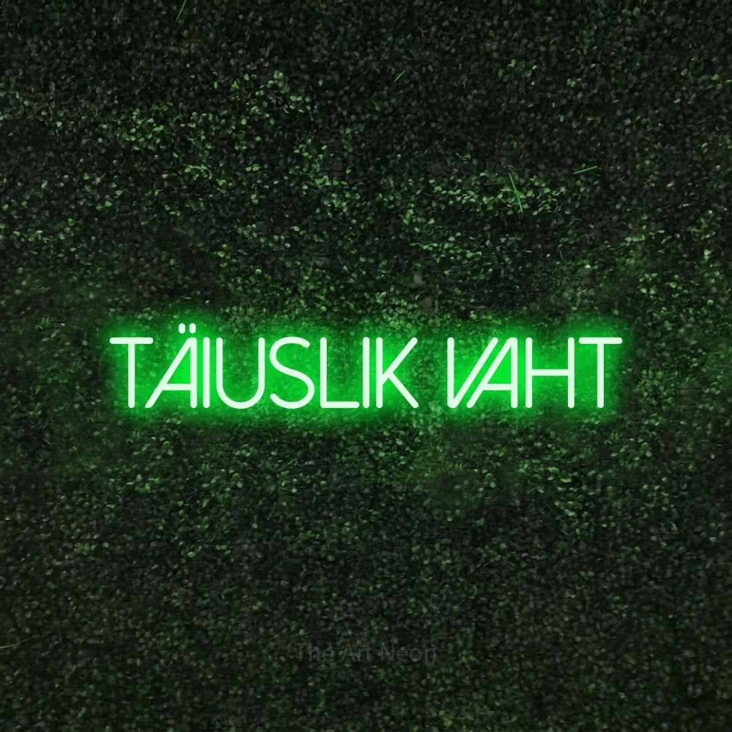 LED neon sign reading “TÄIUSLIK VAHT”, arranged in a single line.