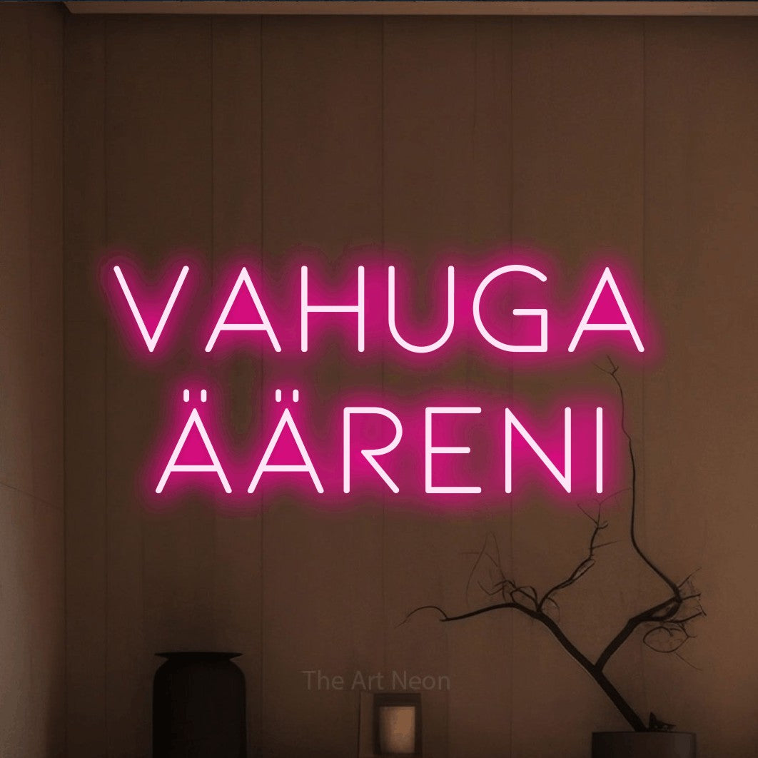 LED neon sign reading “VAHUGA ÄÄRENI”, arranged in two lines.