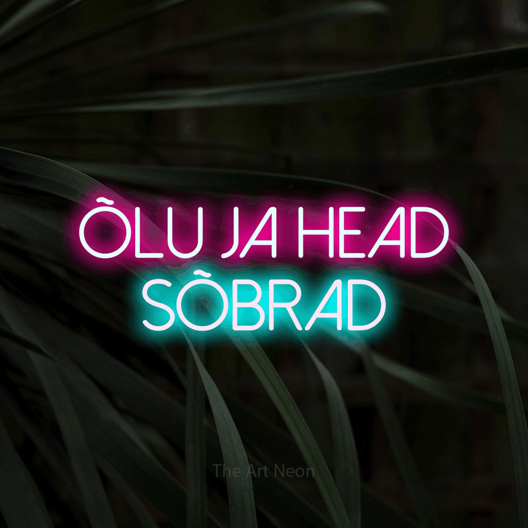 LED neon sign reading “ÕLU JA HEAD SÕBRAD”, arranged in two lines.