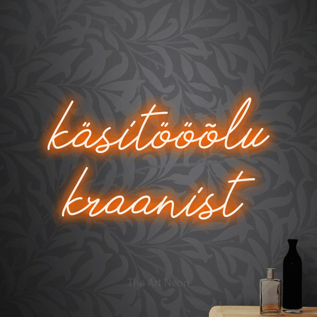 LED neon sign reading “käsitööõlu kraanist”, arranged in two lines.