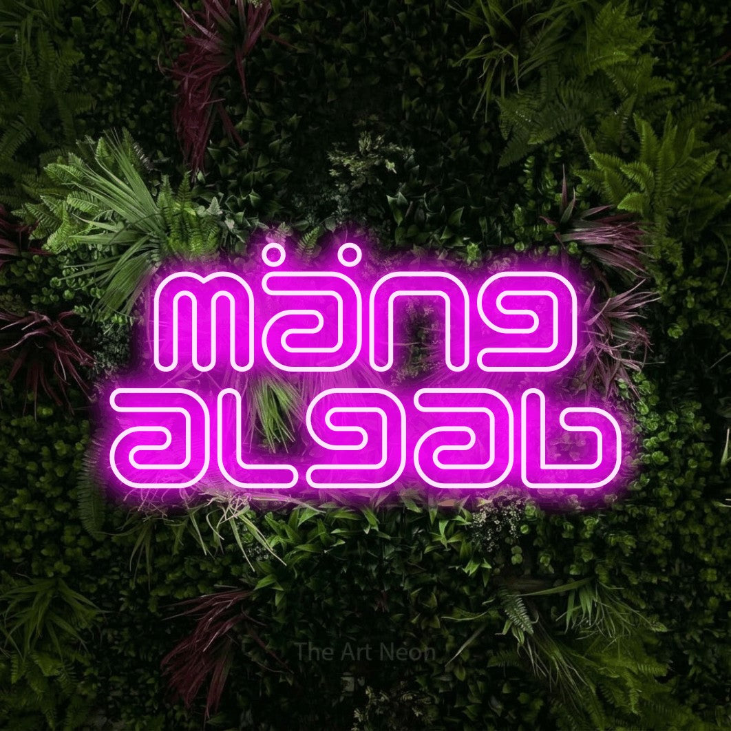 LED neon sign reading “mäng algab”, arranged in two lines.