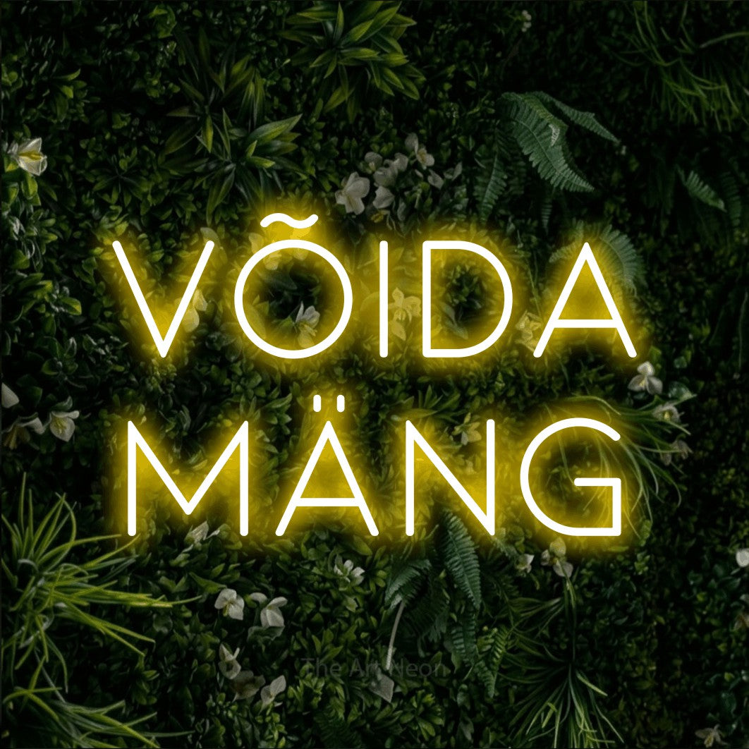 LED neon sign reading “võida mäng”, arranged in two lines.