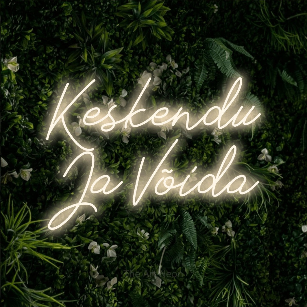 LED neon sign reading “Keskendu Ja Võida”, arranged in two lines.