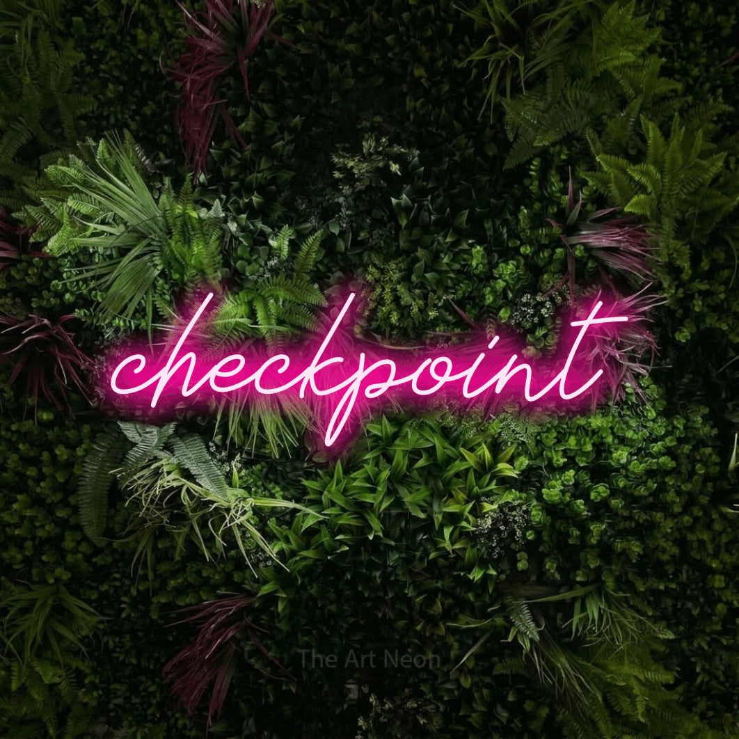 LED neon sign reading “checkpoint”, arranged in a single line.