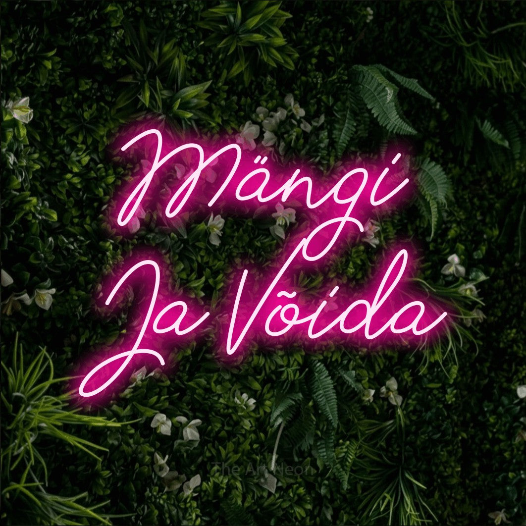 LED neon sign reading “Mängi Ja Võida”, arranged in two lines.