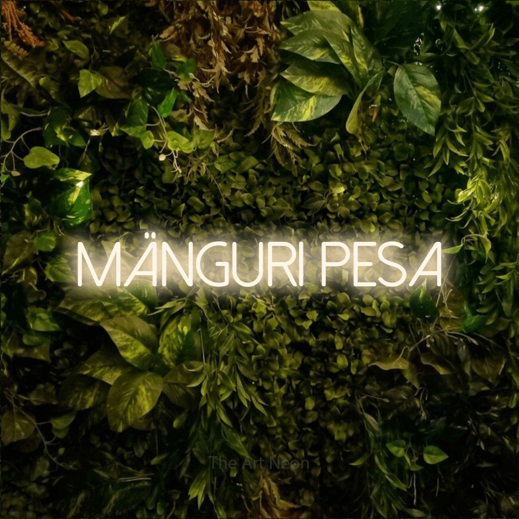 LED neon sign reading “mänguri pesa”, arranged in a single line.