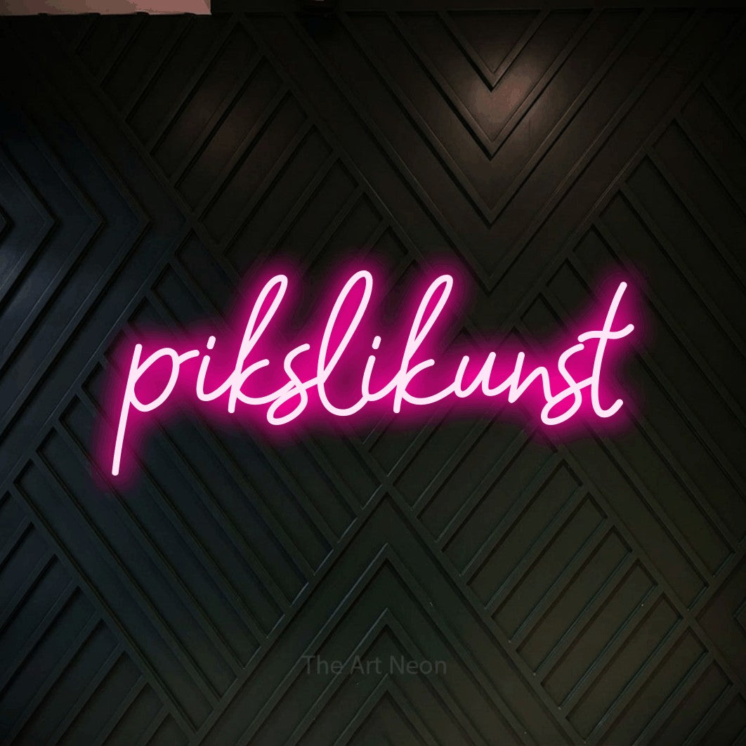 LED neon sign reading “pikslikunst”, arranged in a single line.
