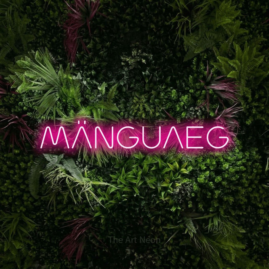 LED neon sign reading “MÄNGUAEG”, arranged in a single line.