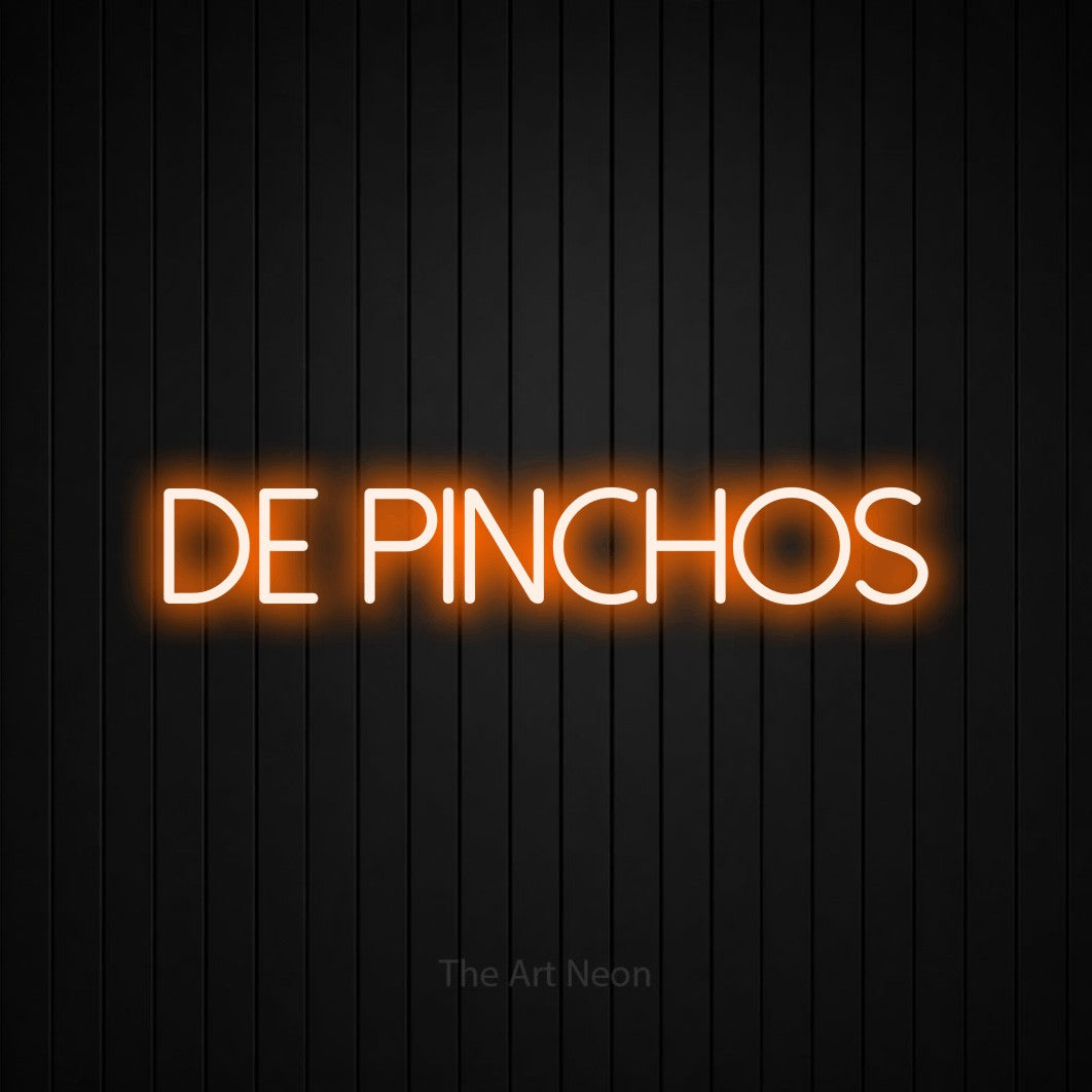 LED neon sign reading “de pinchos”, arranged in a single line.