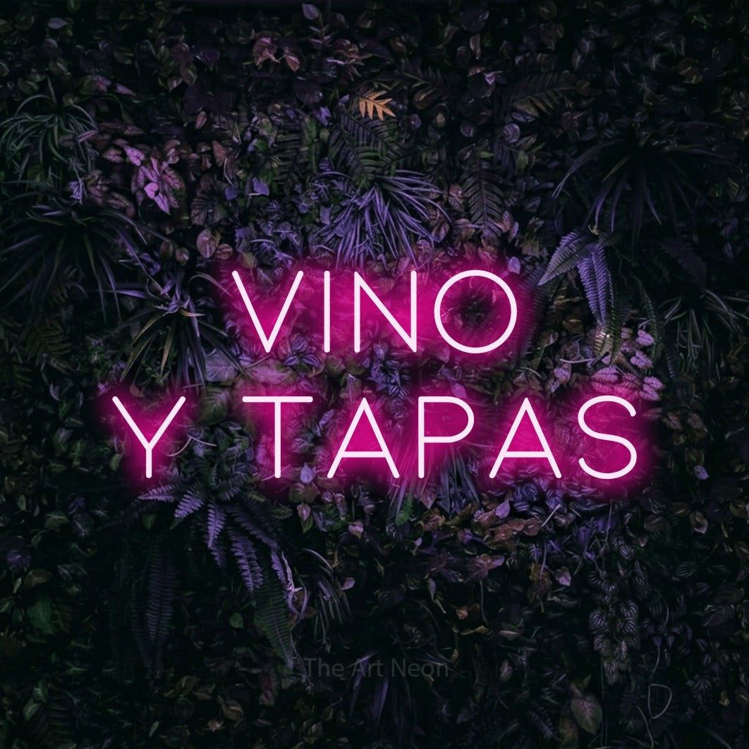 LED neon sign reading “VINO Y TAPAS”, arranged in 2 lines.