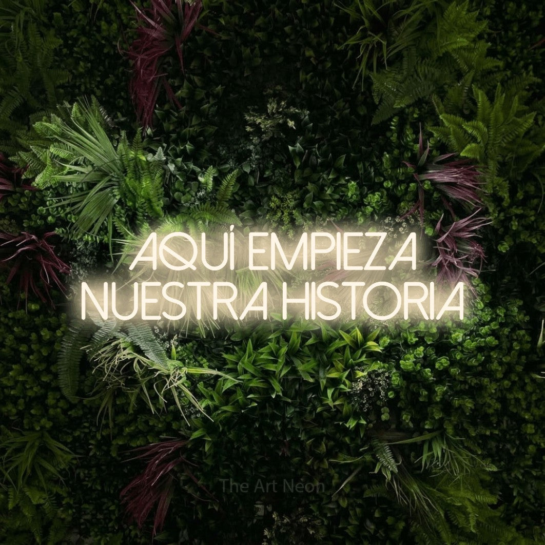 LED neon sign reading “aquí empieza nuestra HISTORIA”, arranged in 2 lines.