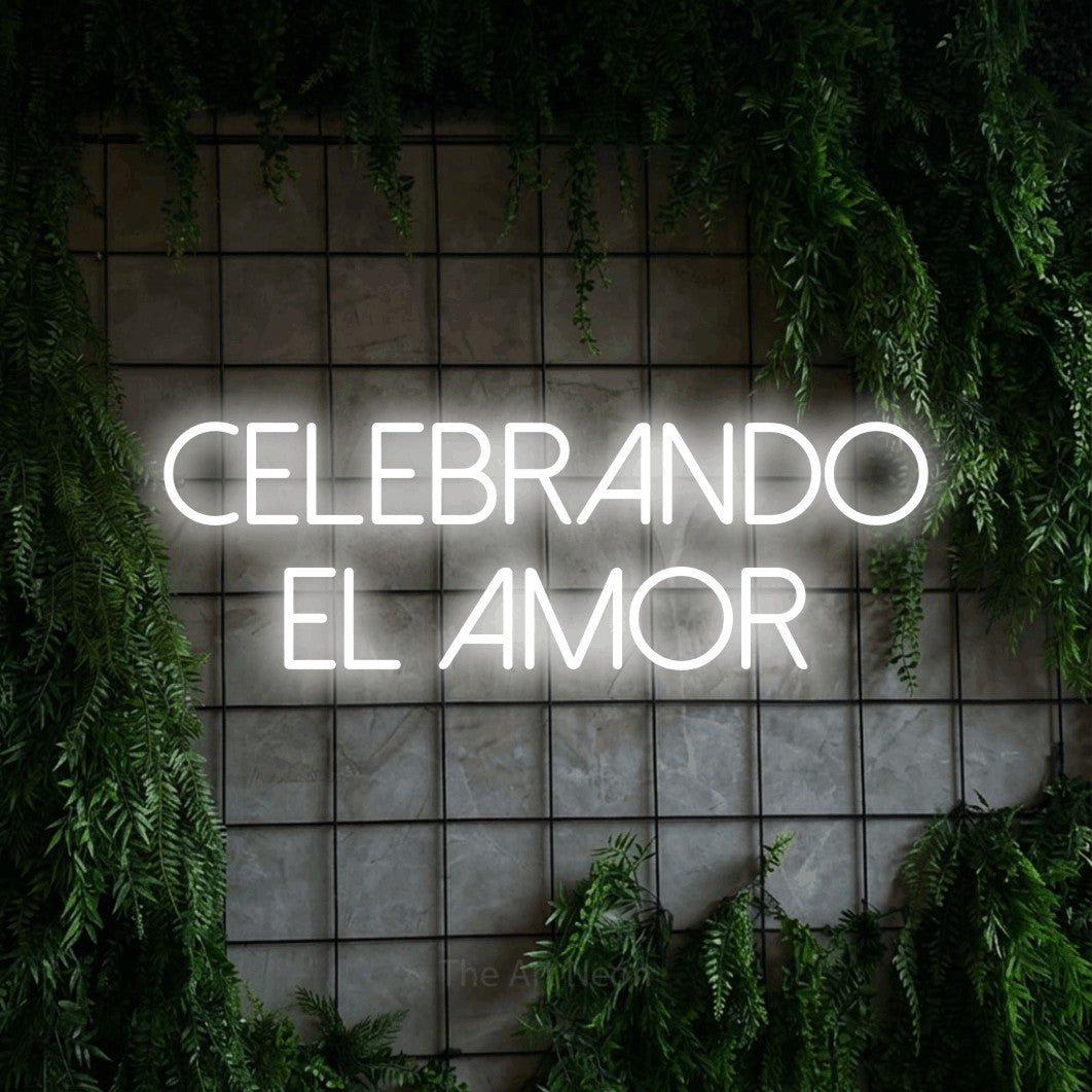 LED neon sign reading “Celebrando el Amor”, arranged in 2 lines.
