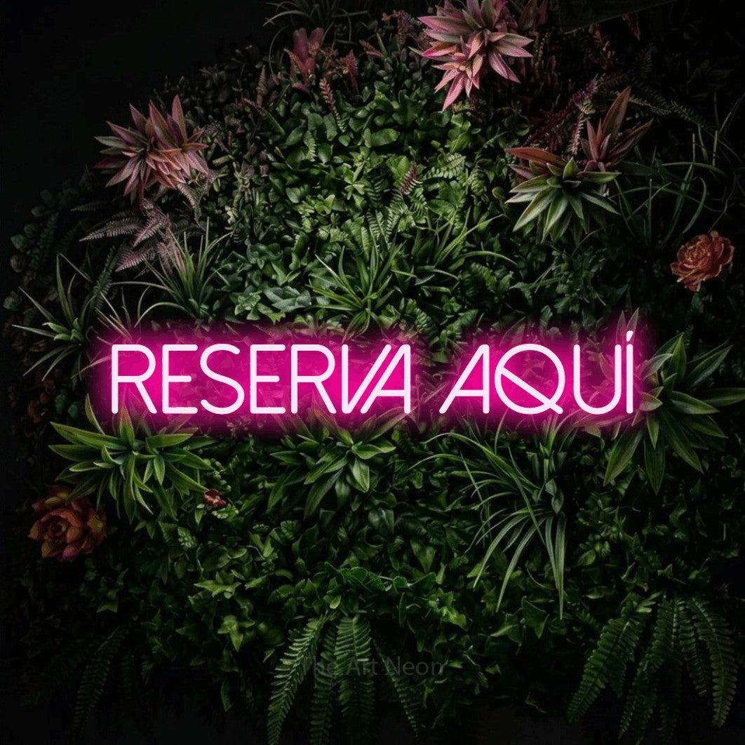 LED neon sign reading “Reserva Aquí”, arranged in a single line.