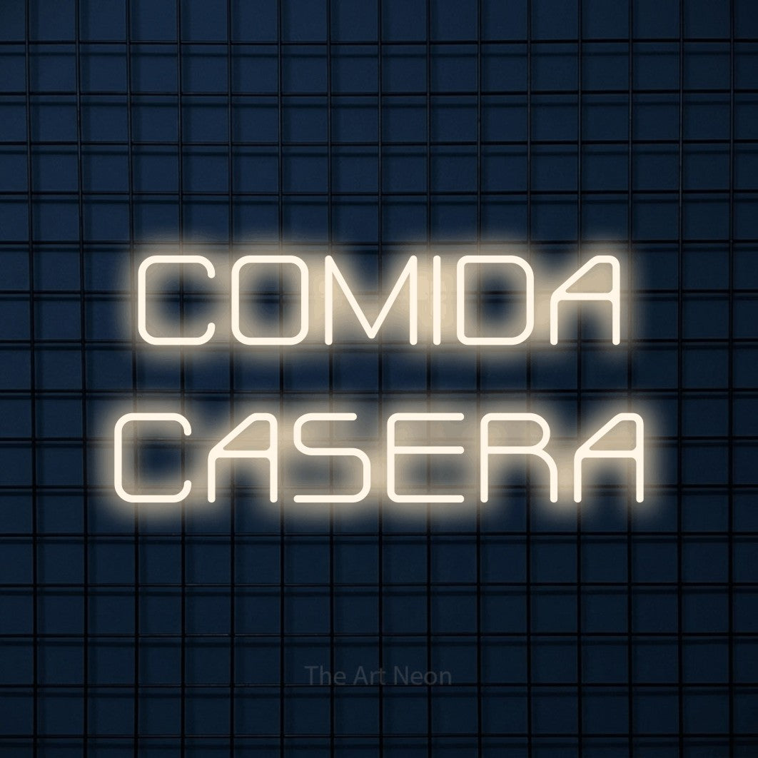 LED neon sign reading “COMIDA CASERA”, arranged in 2 lines.
