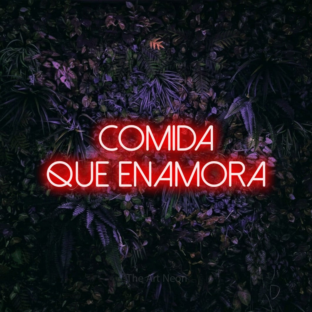 LED neon sign reading “COMIDA QUE ENAMORA”, arranged in 2 lines.