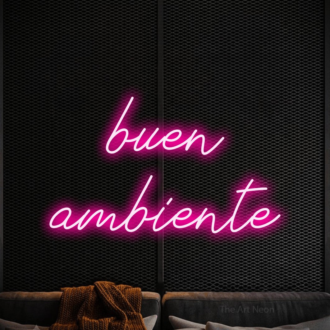 LED neon sign reading “buen ambiente”, arranged in 2 lines.