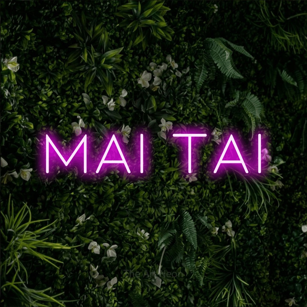 LED neon sign reading “mai tai”, arranged in a single line.