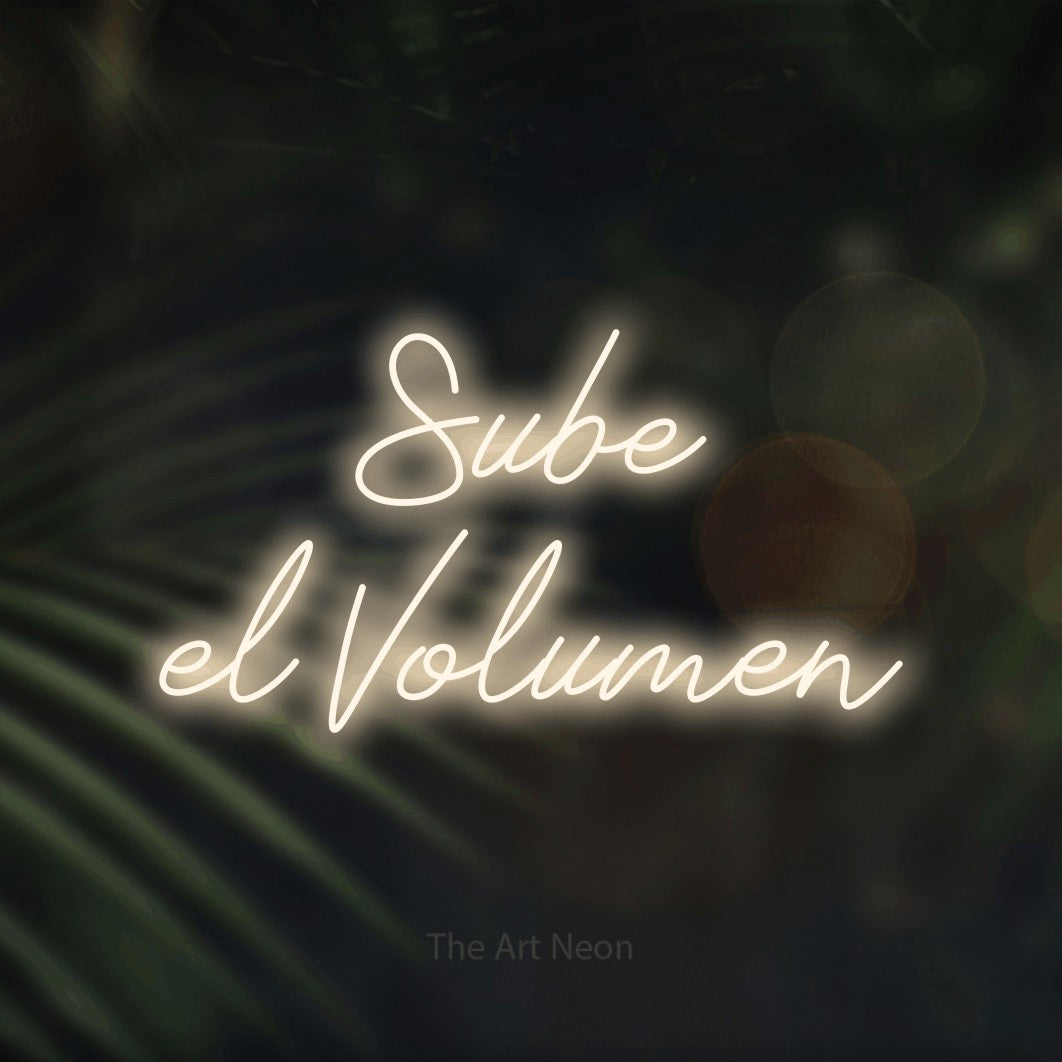 LED neon sign reading “Sube el Volumen”, arranged in 2 lines.