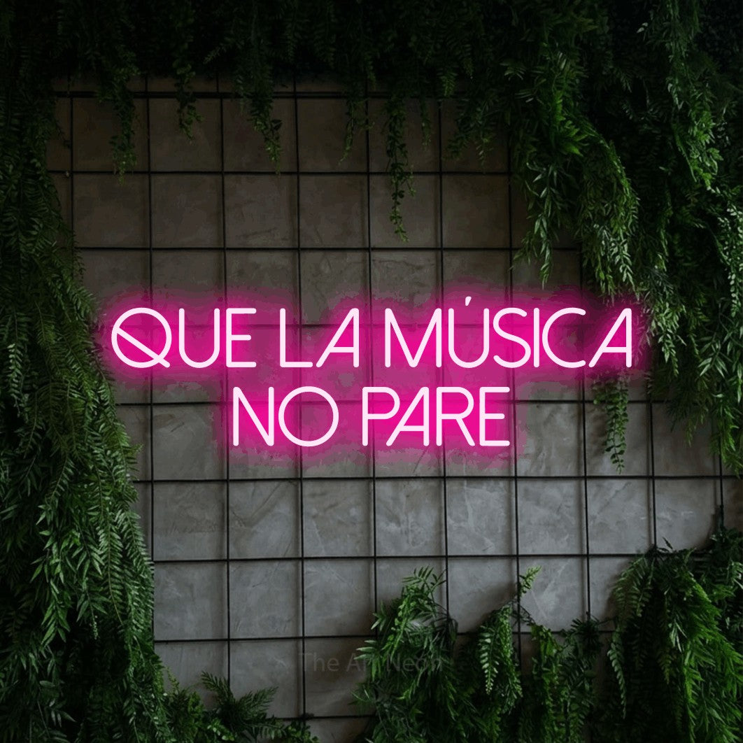LED neon sign reading “Que la música no pare”, arranged in 2 lines.