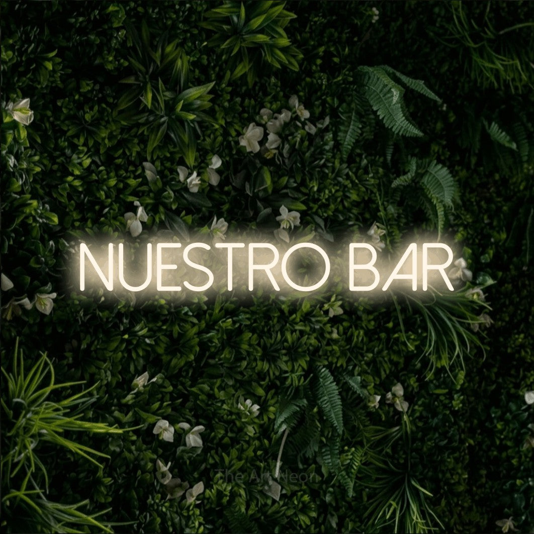 LED neon sign reading “Nuestro Bar”, arranged in a single line.