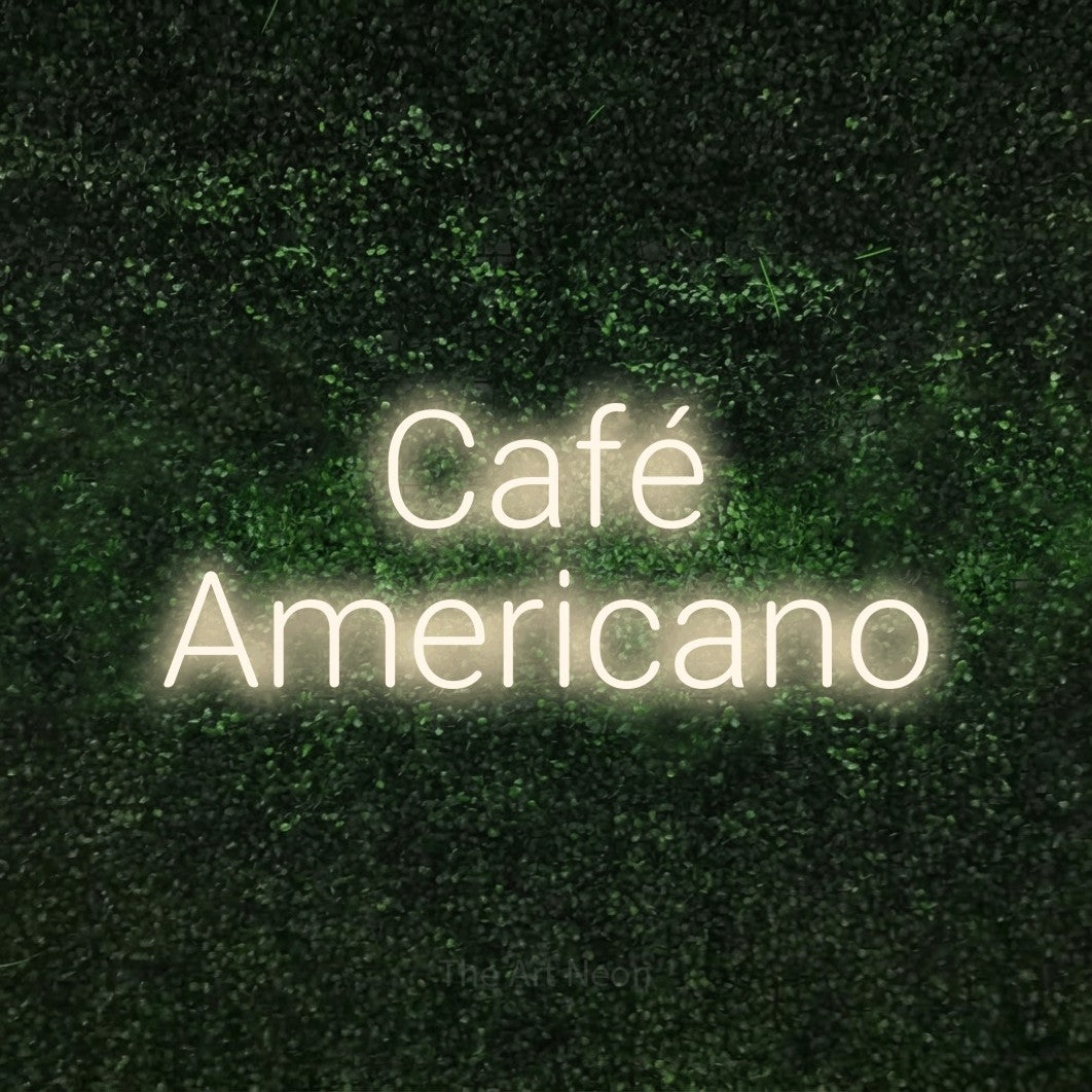 LED neon sign reading “Café Americano”, arranged in 2 lines.
