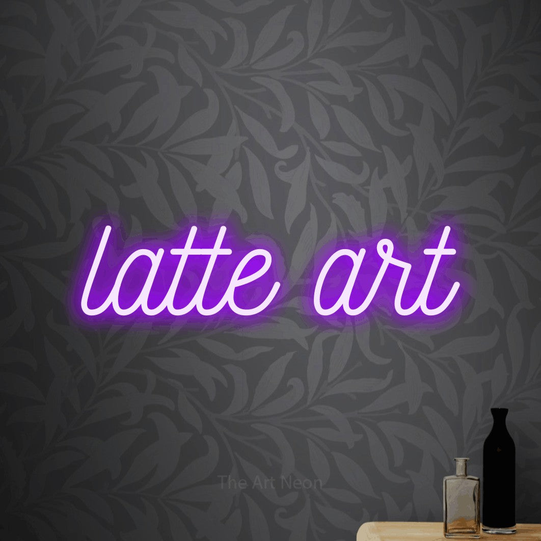 LED neon sign reading “latte art”, arranged in a single line.