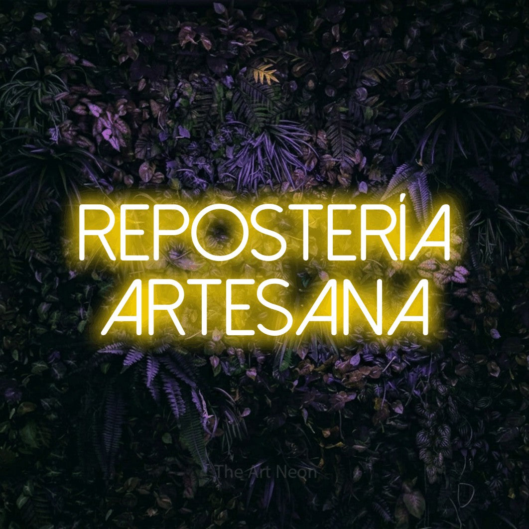 LED neon sign reading “repostería artesana”, arranged in 2 lines.