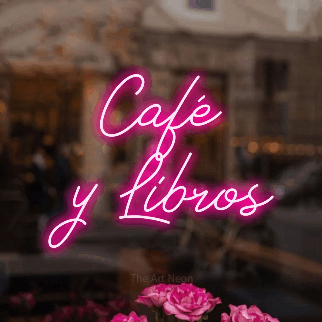 LED neon sign reading “Café y Libros”, arranged in 2 lines.