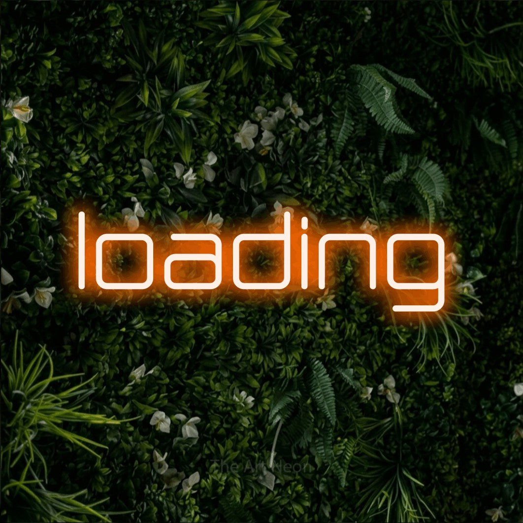 LED neon sign reading “loading”, arranged in a single line.