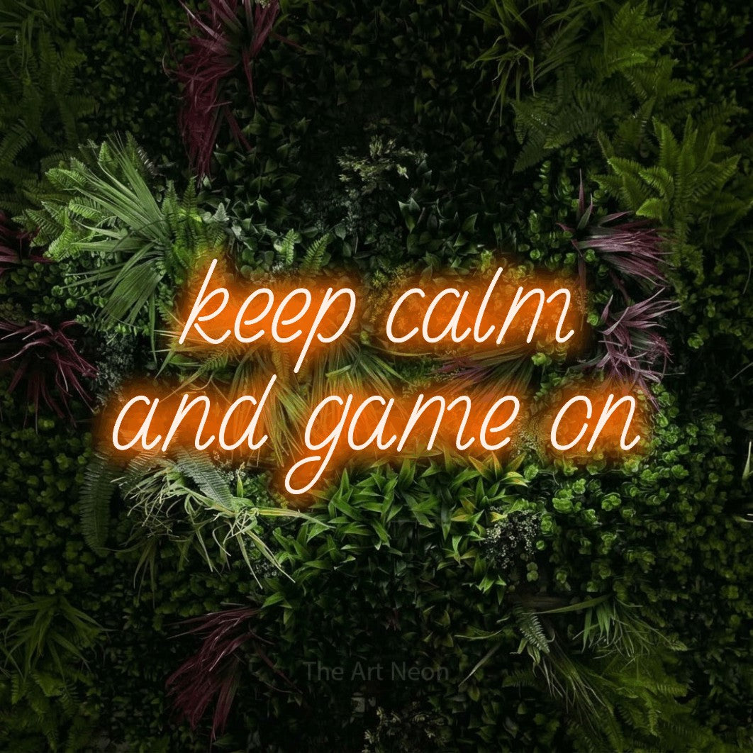 LED neon sign reading “keep calm and game on”, arranged in 2 lines.