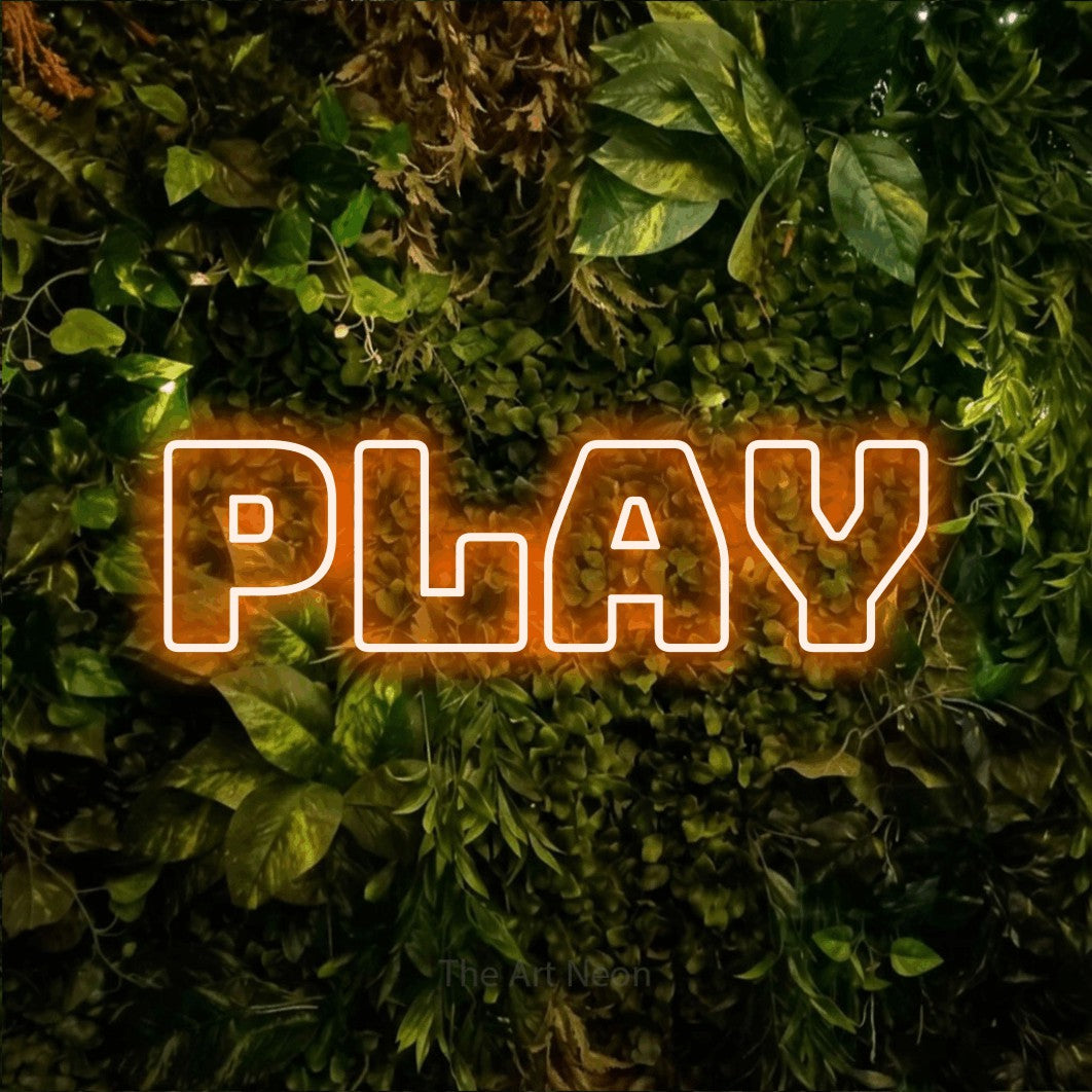 LED neon sign reading “Play”, arranged in a single line.