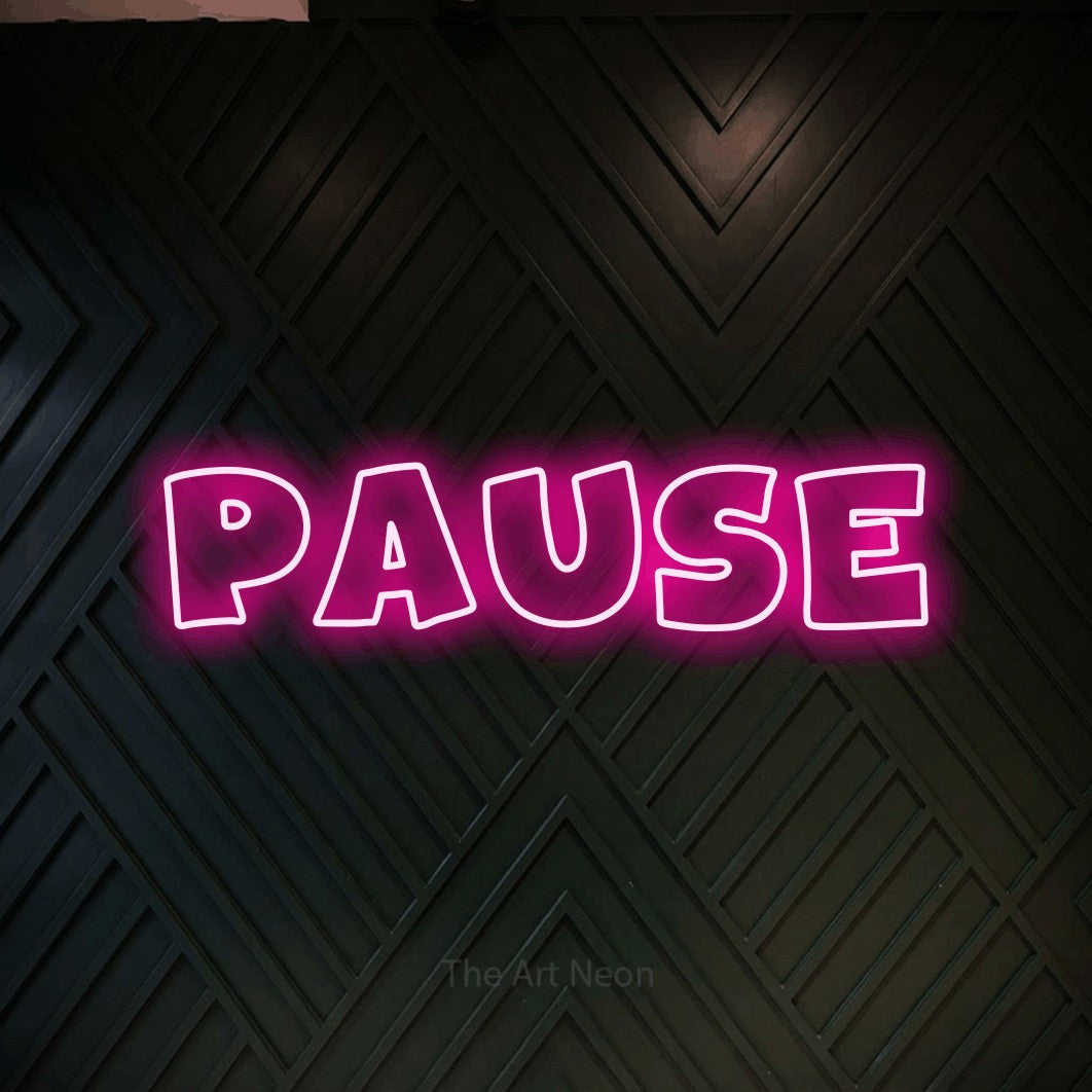 LED neon sign reading “PAUSE”, arranged in a single line.