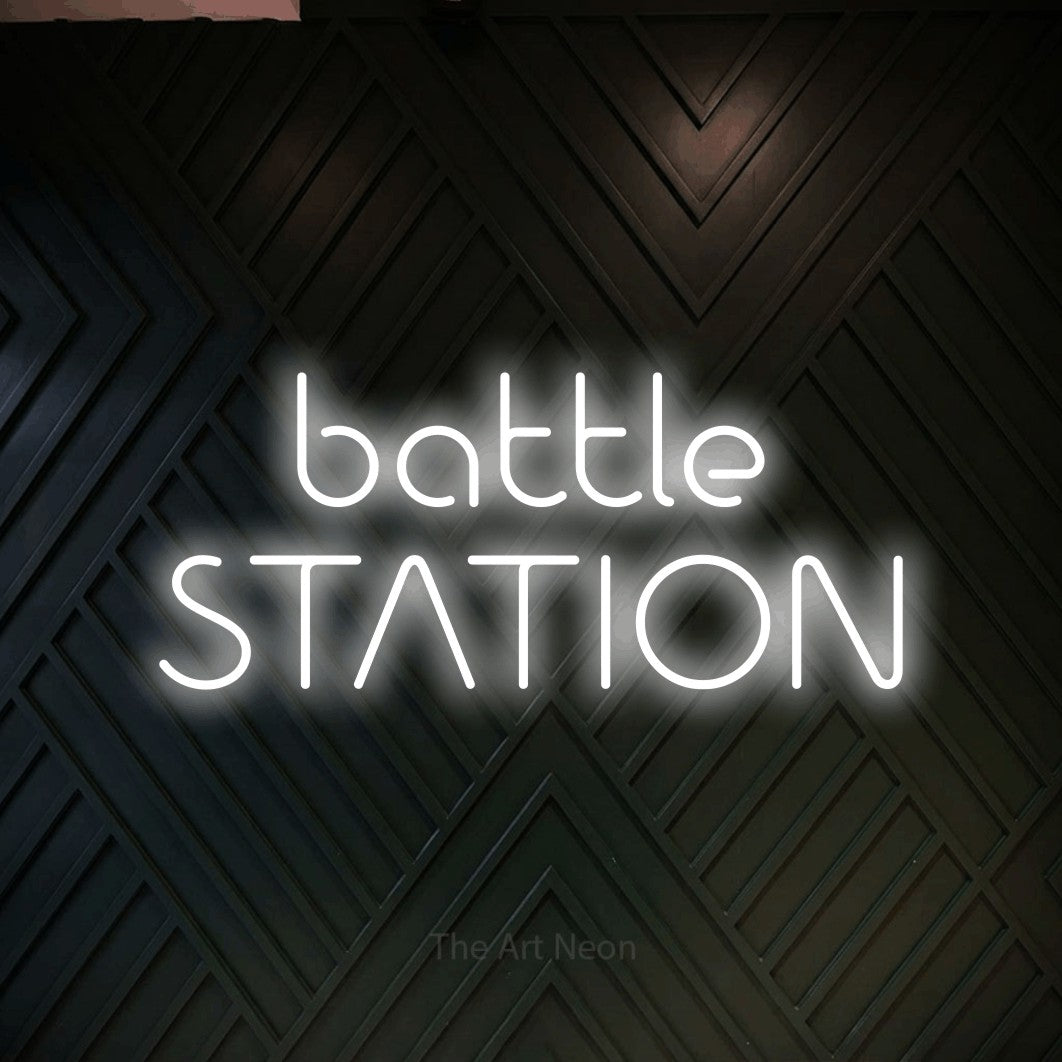 LED neon sign reading “battle STATION”, arranged in 2 lines.