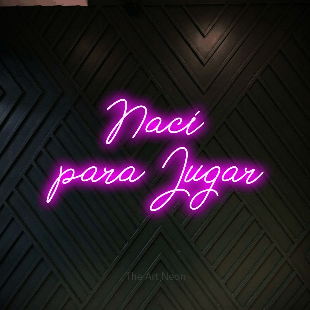 LED neon sign reading “Nací para Jugar”, arranged in 2 lines.