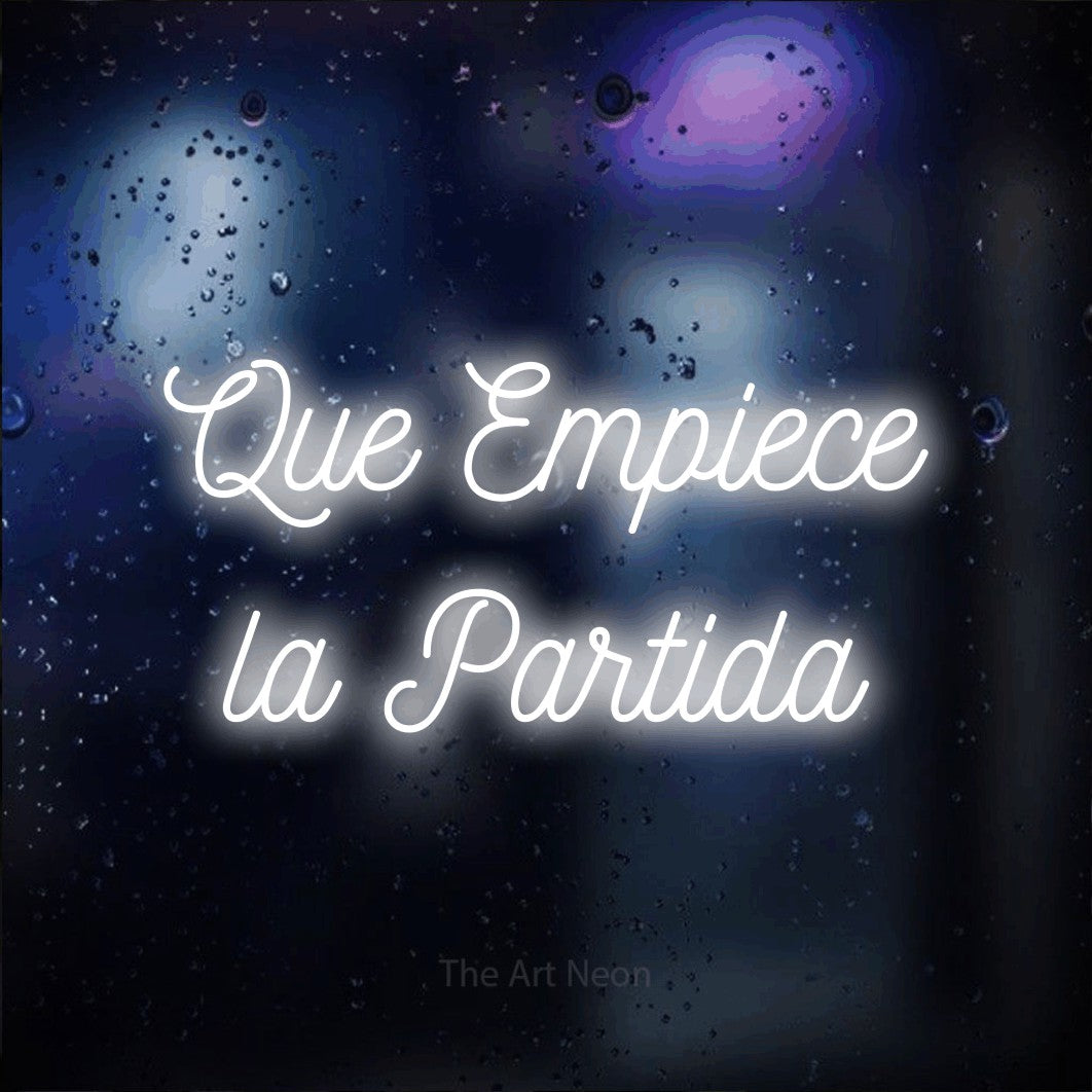 LED neon sign reading “Que Empiece la Partida”, arranged in 2 lines.