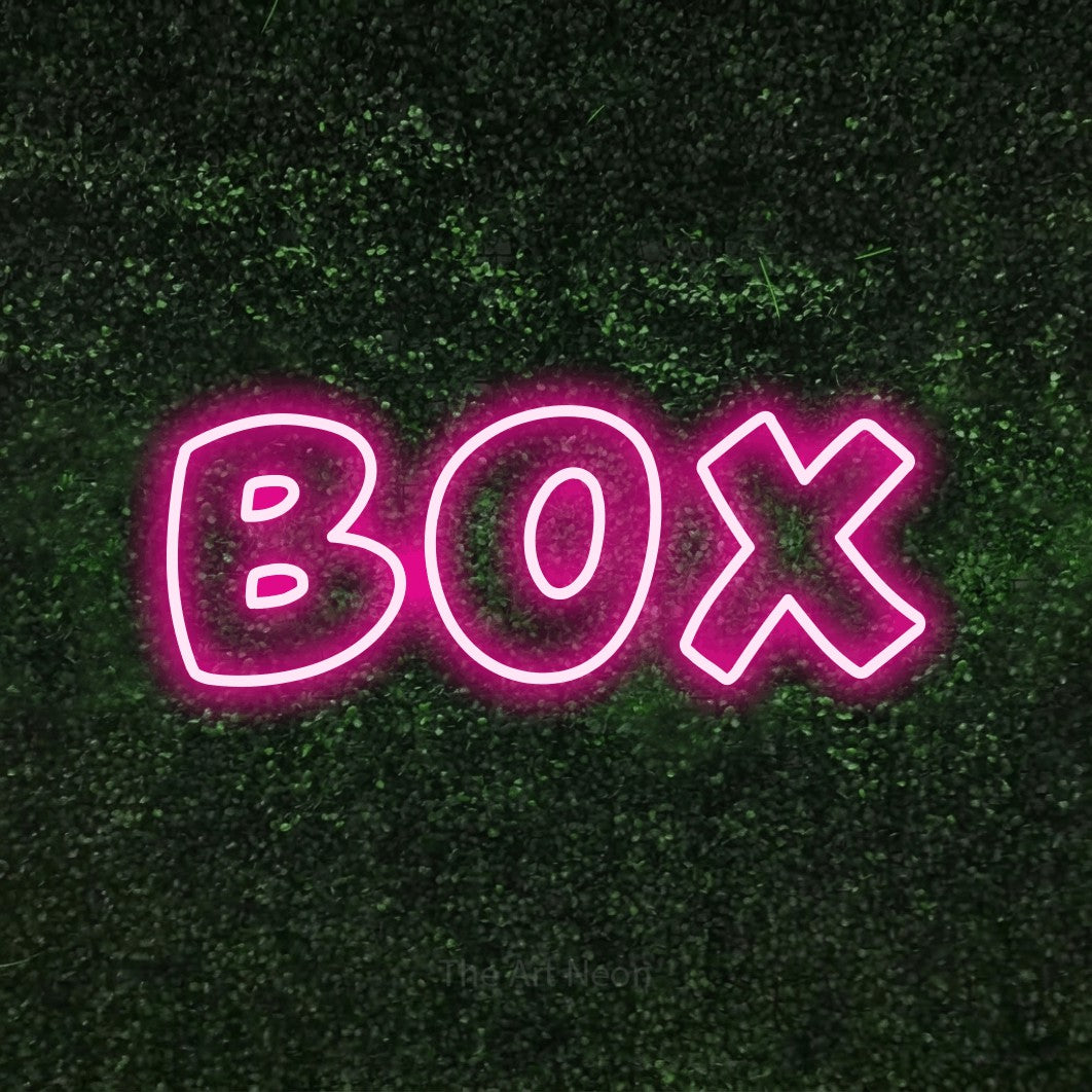 LED neon sign reading “BOX”, arranged in a single line.