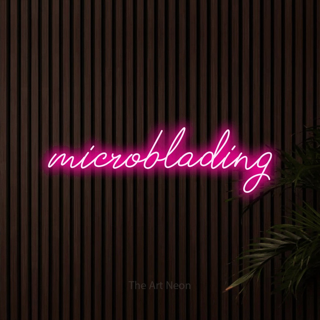 LED neon sign reading “microblading”, arranged in a single line.
